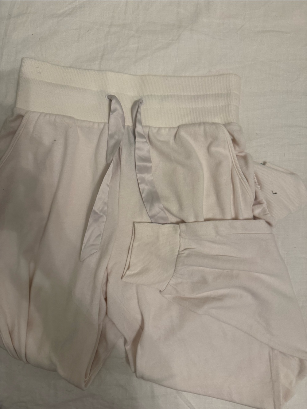 Victoria's Secret white lounge joggers with satin drawstring.